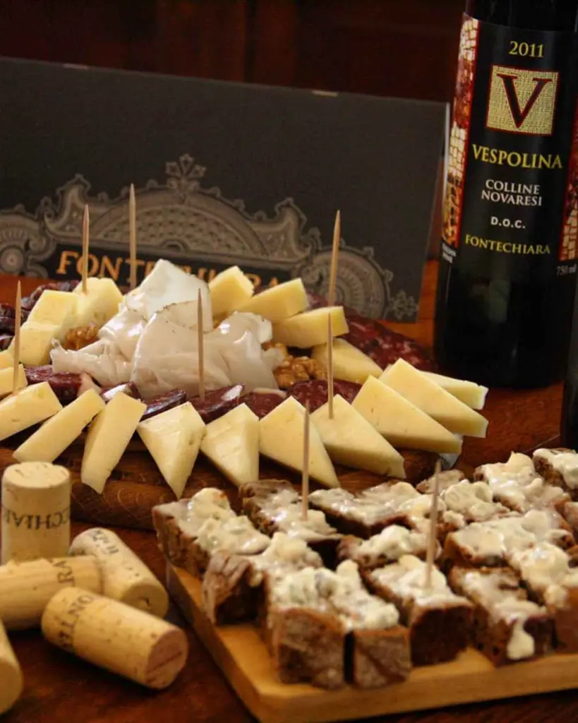 cantina-fontechiara-visit-of-the-cellar-and-wine-tasting-cheese.webp